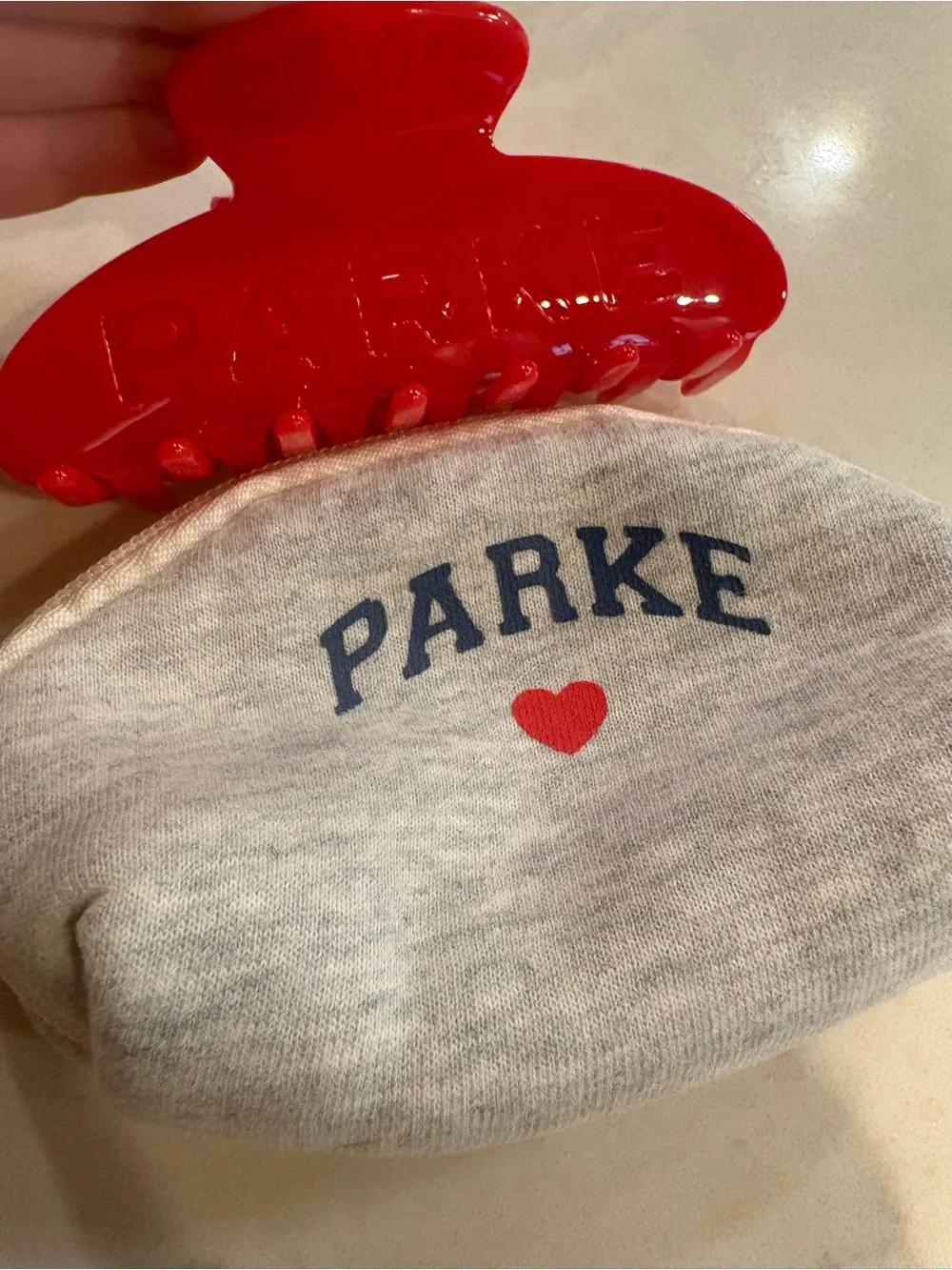 New Parke Bright Red Crimson Claw Clip with Gray Pouch